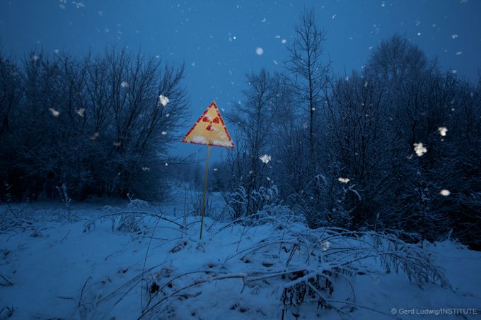 Radion sign along the road near Pripyat warns of nuclear danger